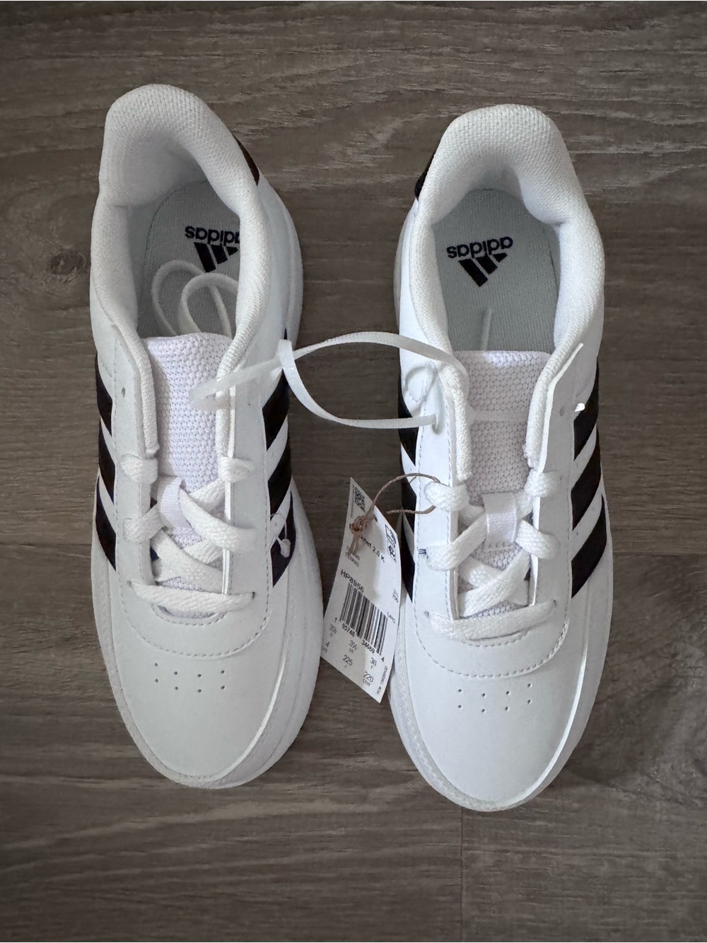 Adidas White Sneakers with Black Stripes